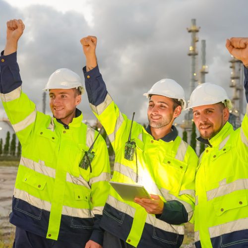 refinery industry engineer are working and discussing at front oil and gas industrial factory refinery industry engineer are working and discussing at front oil and gas industrial factory